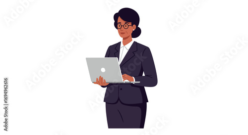 Professional woman in business suit working on laptop