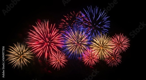 Colorful fireworks display against a dark night sky festive celebration background