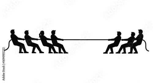 teamwork competition depicted through tug of war silhouette