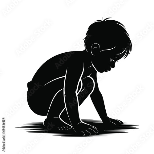 A silhouette of a boy squatting while looking down at the ground