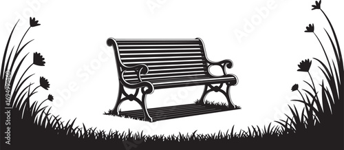 Silhouette of a vintage park bench with surrounding grass and flowers in black and white.