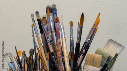 Various professional used paint brushes, selective focus