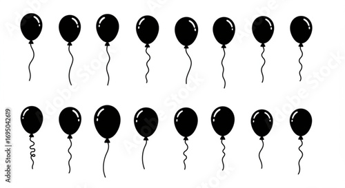 Collection of black balloons with strings isolated on white background