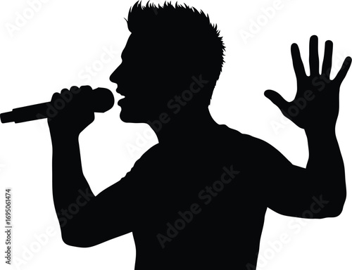 Silhouette of a singer performing stage with a microphone, image captures energy and passion of a live music performance