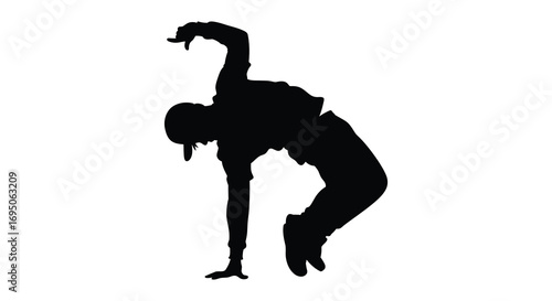 a silhouette of a dancer performing an elegant handstand