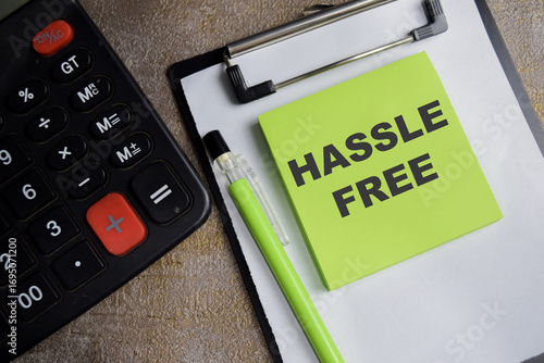Concept of Hassle free write on sticky notes isolated on Wooden Table.
