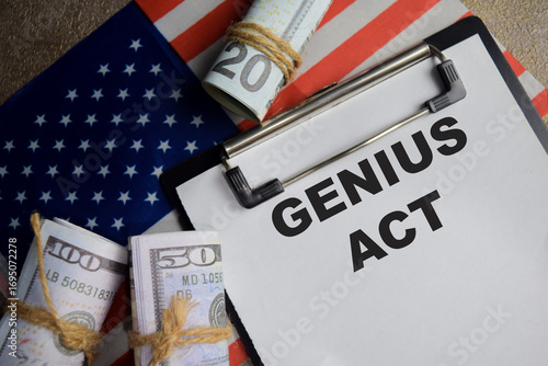 Concept of genius act with the United States flag write on clipboard isolated on Wooden Table.