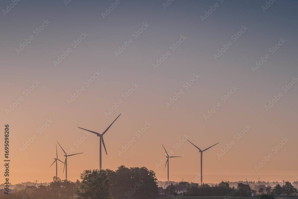Obraz premium Wind turbines as green energy for the Pałuki region