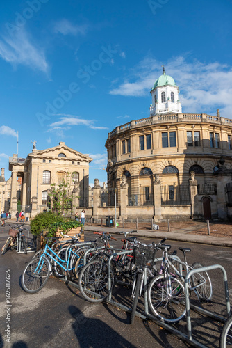 Oxford England UK. 31.08.2025. Cycle park on Broad Street Oxford with background of the Radcliffe Camera building.