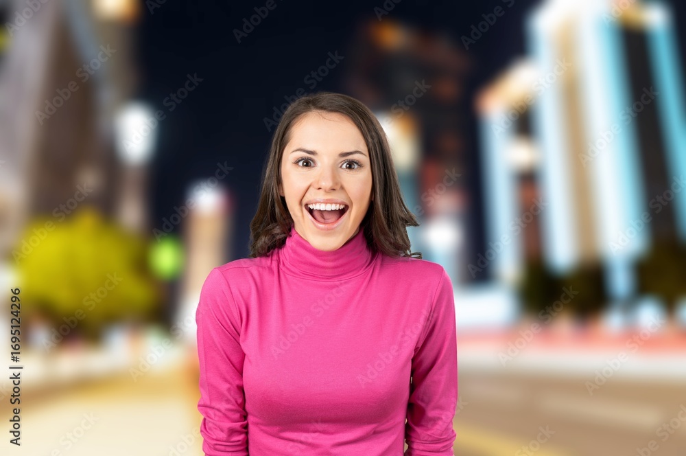 Fototapeta premium Portrait, young happy woman posing outdoor