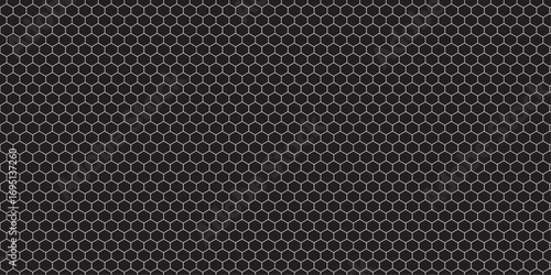 A seamless carbon fiber grid texture with a dark metallic pattern for a high-tech industrial wallpaper design