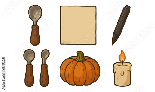 Cozy autumn essentials with pumpkin, candle, and wooden utensils in vintage style