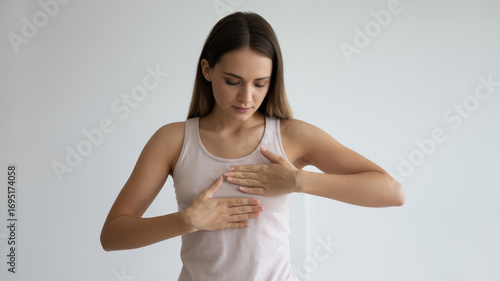 Woman Practicing Self-Breast Examination for Early Cancer Detection