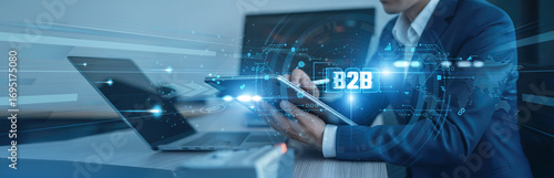 Фотография B2B, enterprise solutions Businessman using tab with analysis data of growth to