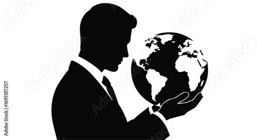 Businessman holding a glowing globe, contemplating global connection and opportunity