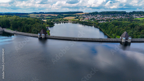 Aerial drone view of a huge stone dam on the lake Monetalsperre - Spermauer, Germany