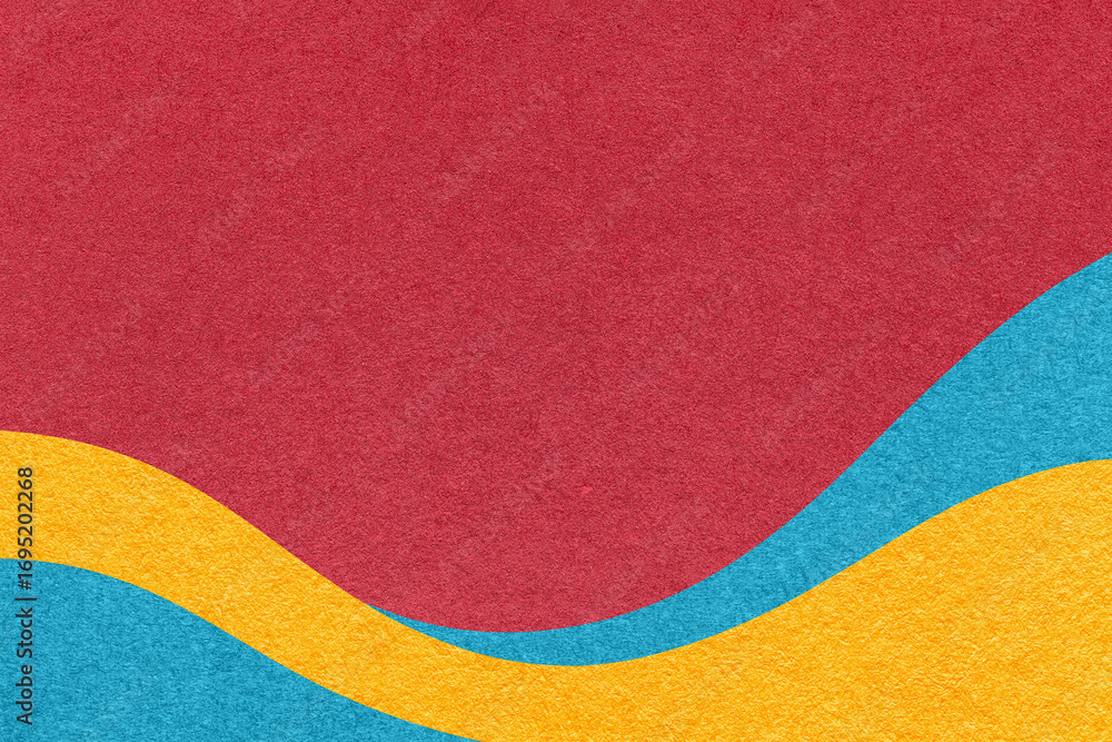 Fototapeta premium Textured red paper background with turquoise and yellow wavy lines and waves, copy space for banner, presentation