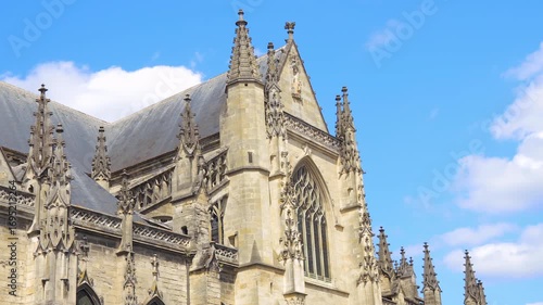 Facade of Saint-Michel basilica of Bordeaux, France on a sunny day