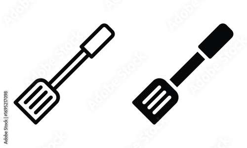 Spatula icon with outline and glyph style.