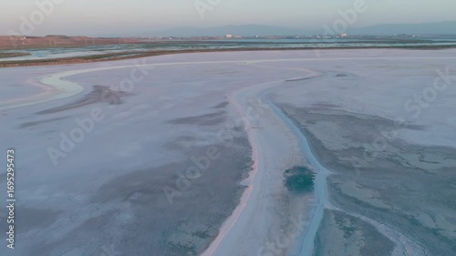 Aerial view of the San Francisco Bay Salt Ponds, Fremont, California, USA. The ponds are used to evaporate seawater to produce salt. The colors are due to different salinity levels.