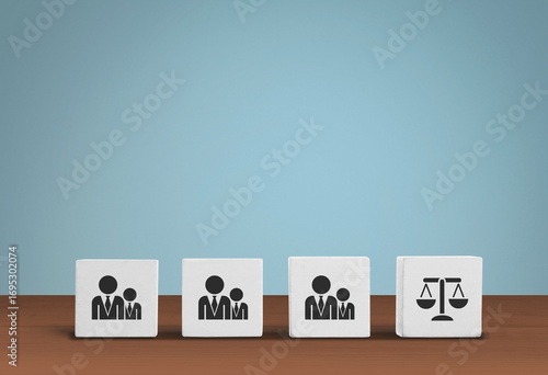 Obraz na płótnie Employment laws and regulations on wooden cubes. Business ethics.