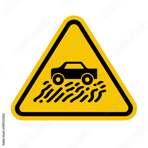 Distinctive yellow warning sign alerting drivers to loose gravel or an uneven road surface, emphasizing cautious driving and road safety