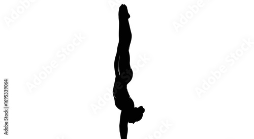 Silhouette of a skilled yogi performing a graceful handstand posture in monochrome