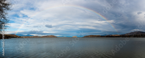 Rainbow over Upper Klamath Lake after a rainfall, Klamath Falls, Oregon, USA.