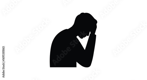 a person silhouette holding head in hands showing distress