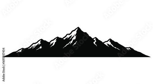 a majestic mountain range silhouette against clear sky