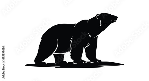 Powerful polar bear silhouette standing on ice, symbolizing wild nature and Arctic strength.