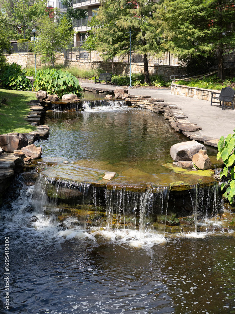 Naklejka premium Manmade Water Feature with Waterfall in The Woodlands, Texas