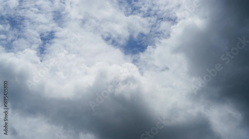 clouds and blue sunny sky,  white clouds over blue sky, Aerial view,  nature, blue sky, white clear weather. Time-lapse video 4 K.