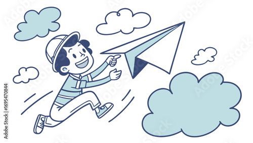 Happy boy running and throwing a paper airplane in the sky