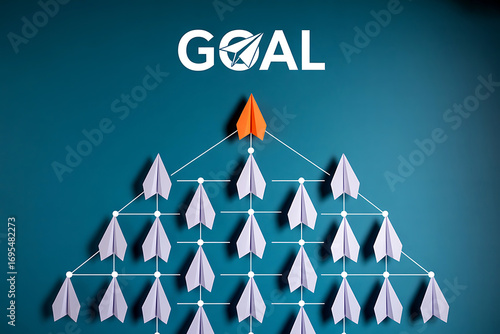 Paper airplane hierarchy leading to success and reaching the ultimate goal symbolizing achievement and ambition