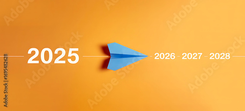 Paper airplane soaring towards the future in 2025 symbolizing innovation new beginnings and forward momentum for business and personal growth