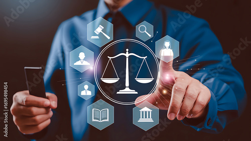 Lawyer interacts with digital interface displaying justice scales and legal icons symbolizing law and order in modern legal technology concept