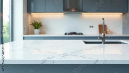 Immaculately white marble kitchen counter, blurred blue tones , backdrop, interior