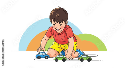A happy and smiling young boy plays with toy cars and enjoys his playful activity
