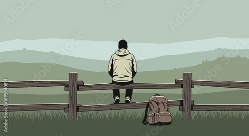 A Person Sitting on a Fence in Front of a Beautiful Mountain Landscape