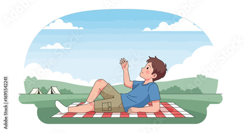 Relaxed Young Man Enjoying Summer Day Lying On Picnic Blanket Outdoors in Sunshine