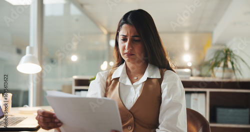 Confused, business and woman with document in office to review report, draft mistake and fact check. Worry, journalist or reading paperwork for editor feedback, headline error and submission deadline