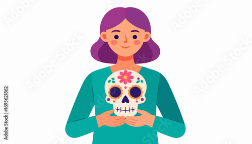 A person holds a decorated skull, symbolizing celebration and remembrance during Dia de los Muertos