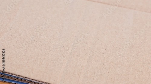 corrugated cardboard texture, brown carton paper for packaging industry, recycling, logistics, export import, and warehouse use, corrugated cardboard for background, paper waste recycling concept