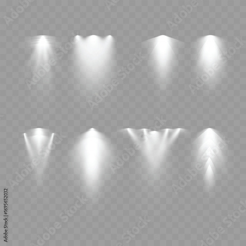 Set of realistic spotlight light effects on transparent background. Vector