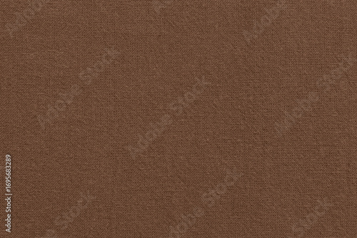 Dark brown fabric cloth texture for background, natural textile pattern.