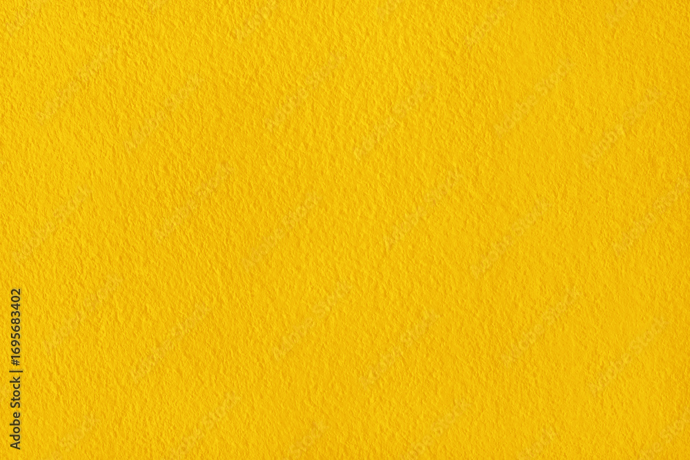 Obraz premium Yellow concrete cement wall texture for background and design.
