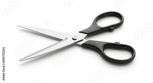 Open scissors with black handles and silver blades, lying on a white surface.