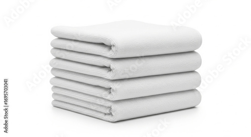 A neat stack of six pristine white cotton towels, folded and arranged on a white background.
