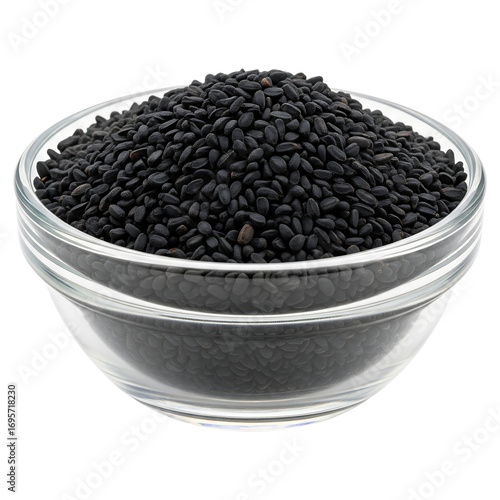 Black sesame seeds in glass bowl: culinary ingredient